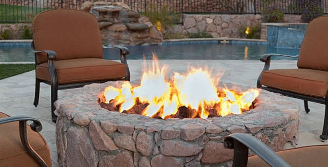 Stone fire pit with flames