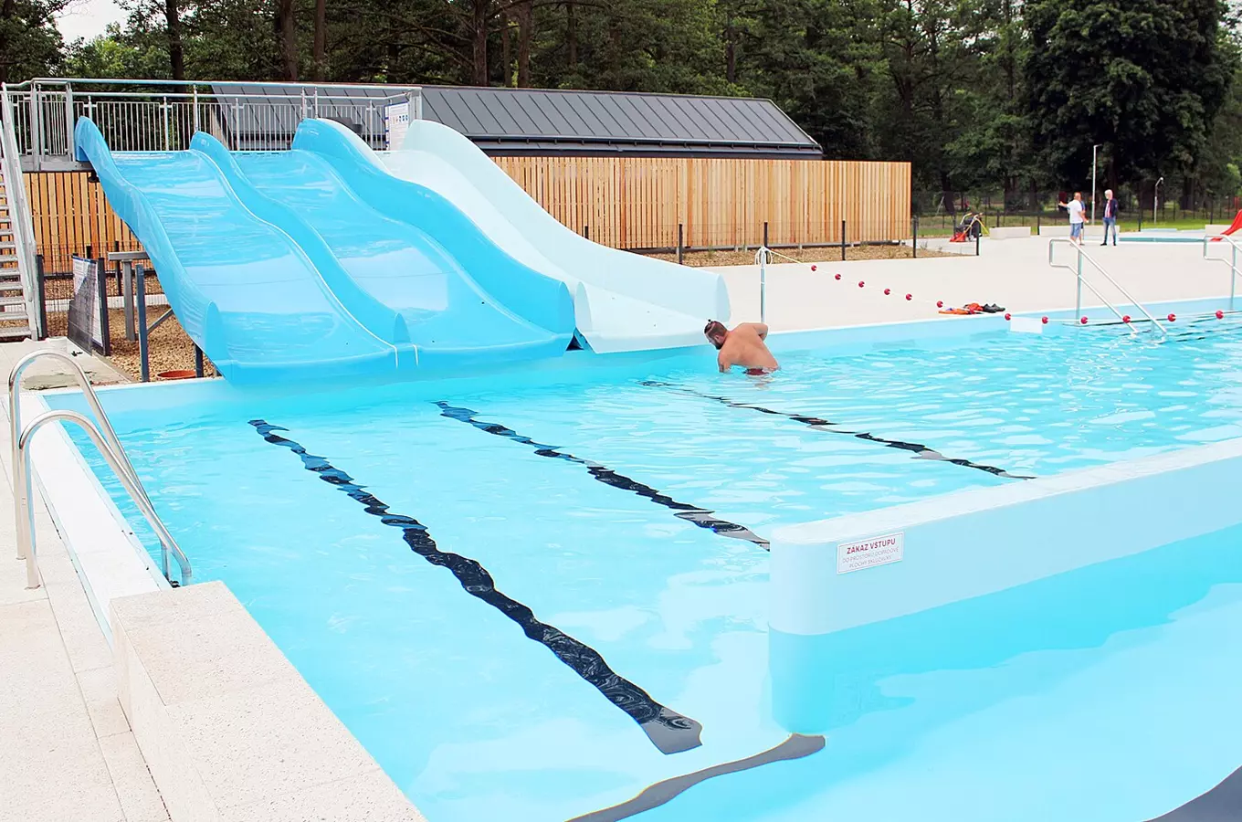 Outdoor swimming pool with slides