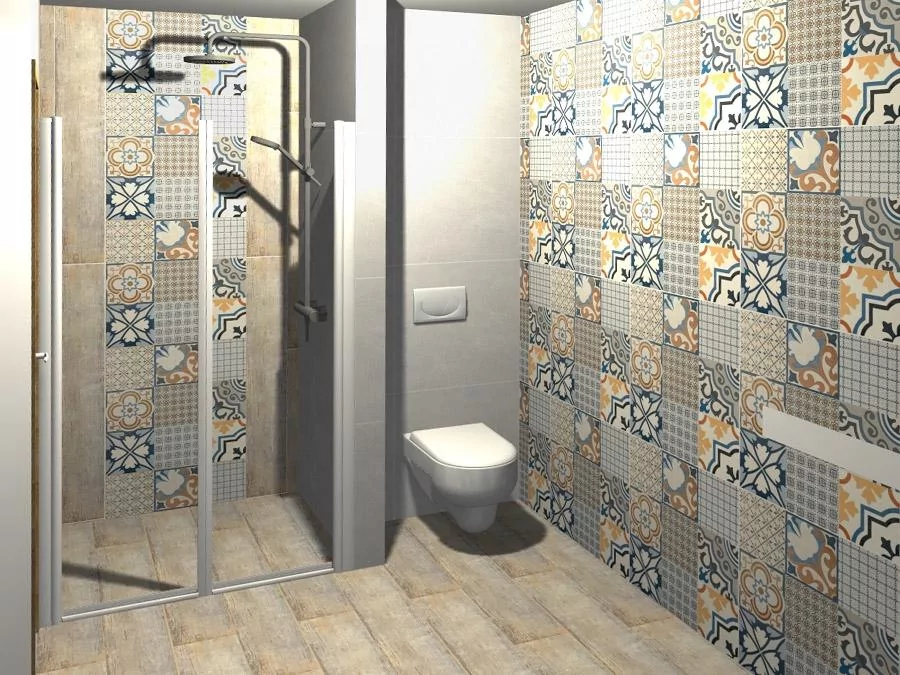 Moderní koupelna s patchwork obklady v geometrickém vzoru.
