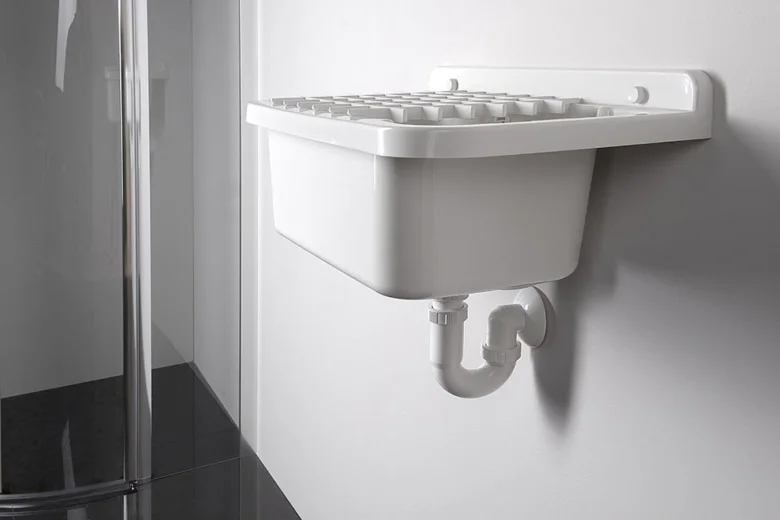 Wall-mounted sink with drainpipe
