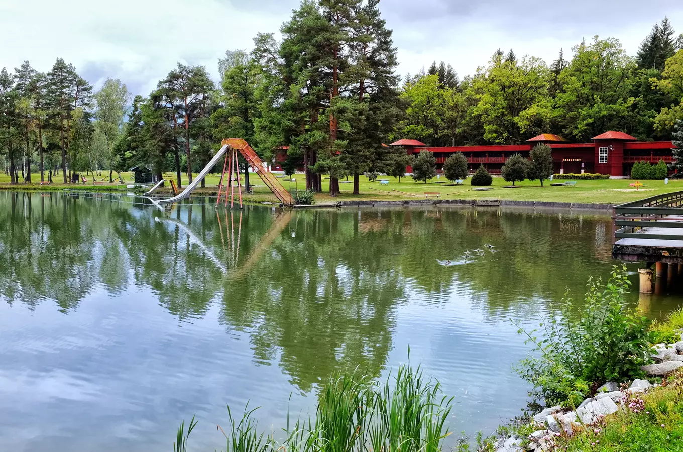 Swimming slide and lake